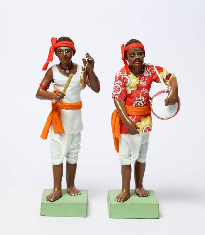 Dholok-aur-Ghanti-Bajanewala-Clay-Decorative-Showpiece-WhiteBG-RainbowFeathers.jpg Dholok-aur-Ghanti-Bajanewala-Clay-Decorative-Showpiece-WhiteBG-RainbowFeathers.jpg