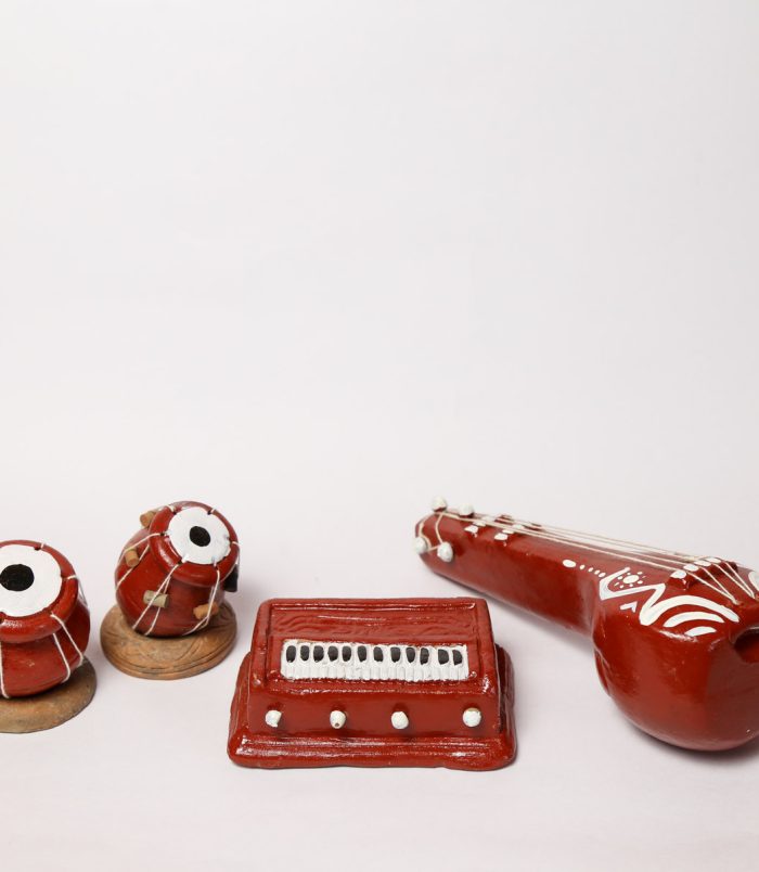 Miniature-Clay-Musical-Instruments-WhiteBG-RainbowFeathers.jpg