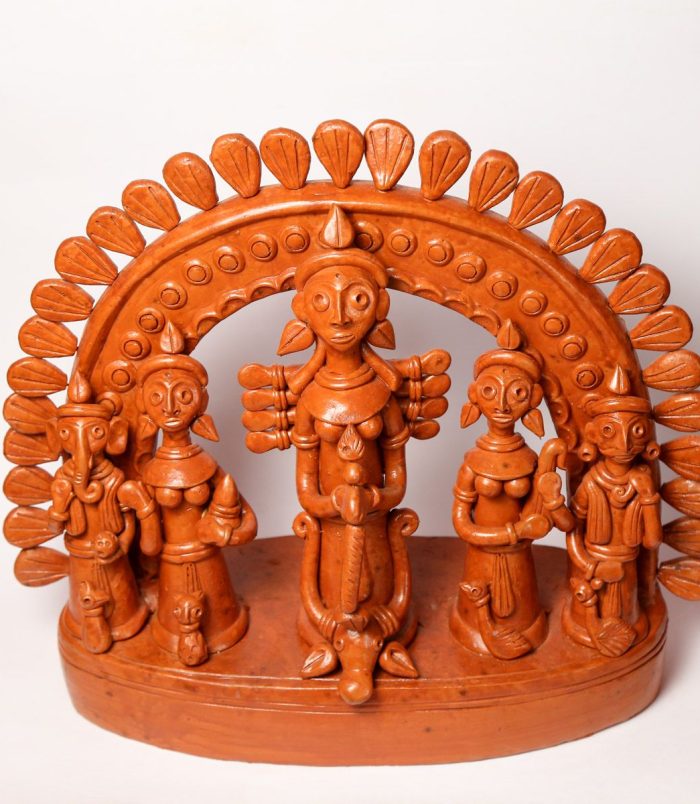 Terracotta-Devi-Durga-with-her-Children-in-Single-Frame-Ekchala-Durga-WhiteBG-TopView-RainbowFeathers.jpg