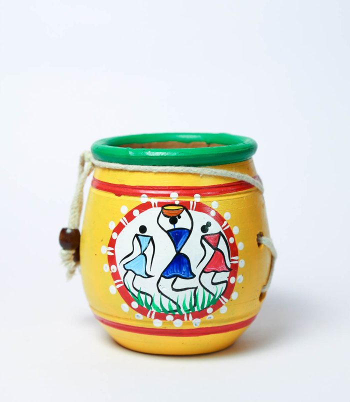 Warli-Hand-Painted-Terracotta-Yellow-Pen-Stand-WhiteBG-RainbowFeathers.jpg Warli-Hand-Painted-Terracotta-Yellow-Pen-Stand-WhiteBG-RainbowFeathers.jpg