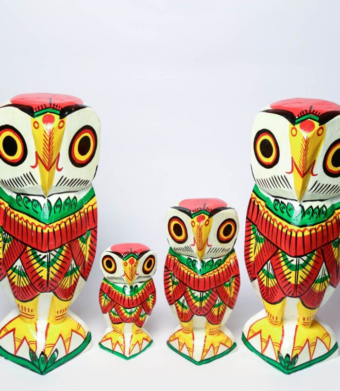 Wealthy-Owl-Family-Wooden-Handcurved-Decorative-Showpieces-Set-of-4-Owls–10-10-6-4-WhiteBG-TopView-RainbowFeathers.jpg