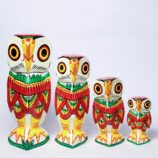 Wealthy-Owl-Family-Wooden-Handcurved-Decorative-Showpieces-Set-of-4-Owls–10-8-6-4-WhiteBG-RainbowFeathers.jpg
