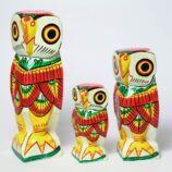 Wooden-Handmade-Wealthy-Owl-Family-Showpieces-Set-of-3-Owls–8-6-4-WhiteBG-Sideview-RainbowFeathers.jpg