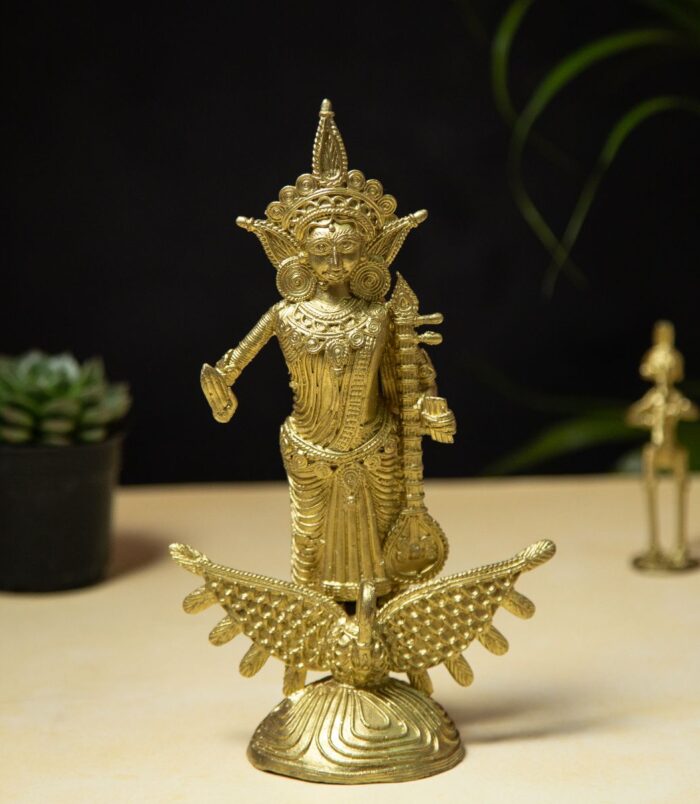 Dhokra-Saraswati-The-Goddess-of-Learning-Standing-on-Swan-RainbowFeathers